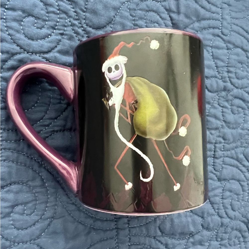 Disney Nightmare Before Christmas 14 oz ceramic mug featuring Jack bag of gifts